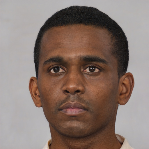Neutral black young-adult male with short  black hair and brown eyes