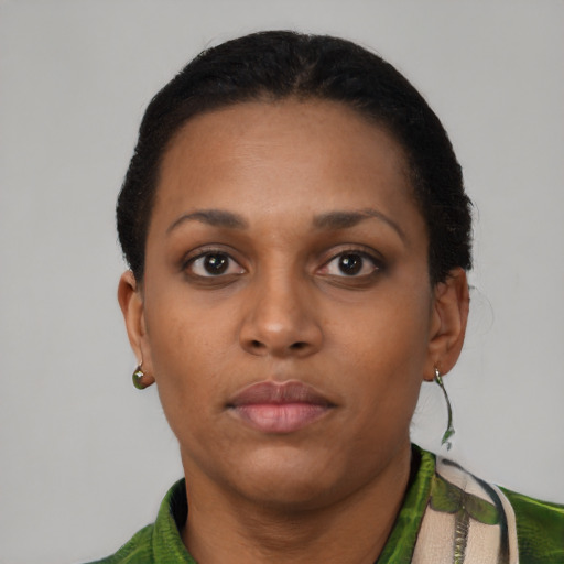 Neutral black young-adult female with short  brown hair and brown eyes