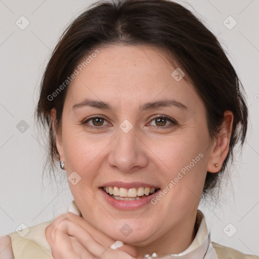 Joyful white adult female with medium  brown hair and brown eyes