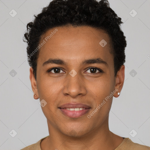 Joyful black young-adult male with short  black hair and brown eyes