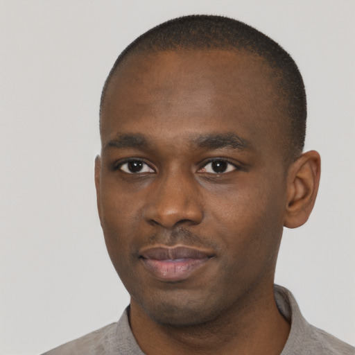 Neutral black young-adult male with short  brown hair and brown eyes