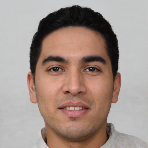 Neutral white young-adult male with short  black hair and brown eyes