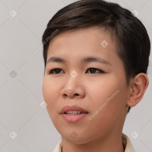 Joyful asian young-adult female with short  brown hair and brown eyes