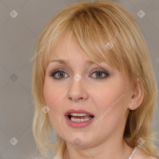 Joyful white young-adult female with medium  blond hair and blue eyes