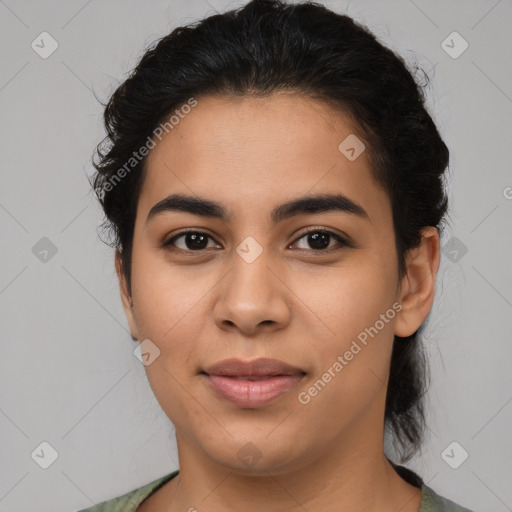 Joyful latino young-adult female with medium  brown hair and brown eyes