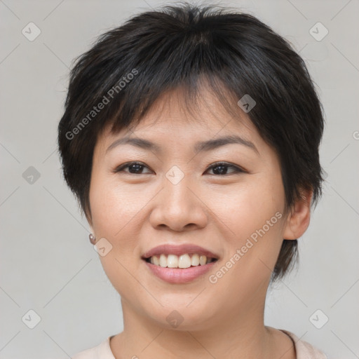 Joyful asian young-adult female with short  brown hair and brown eyes