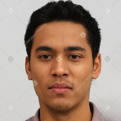 Neutral latino young-adult male with short  black hair and brown eyes