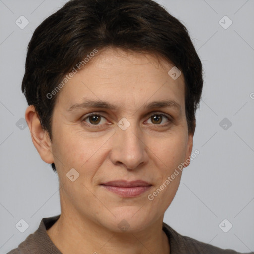 Joyful white adult female with short  brown hair and brown eyes