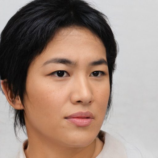 Neutral asian young-adult female with medium  brown hair and brown eyes
