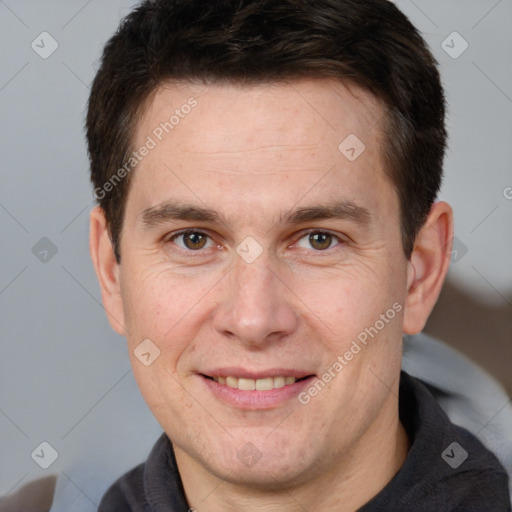 Joyful white adult male with short  brown hair and brown eyes