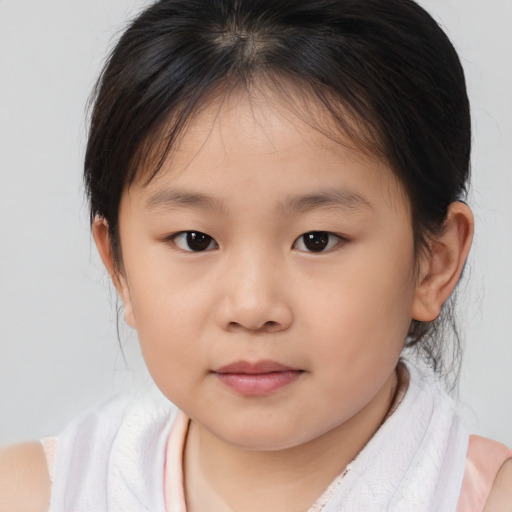 Neutral asian child female with medium  brown hair and brown eyes