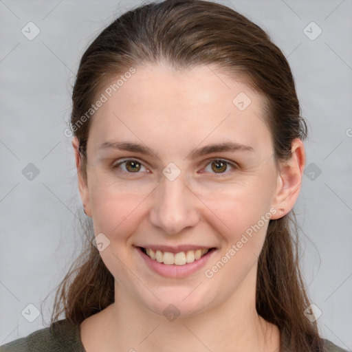 Joyful white young-adult female with medium  brown hair and grey eyes