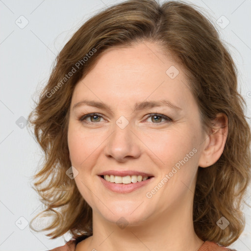 Joyful white young-adult female with medium  brown hair and green eyes