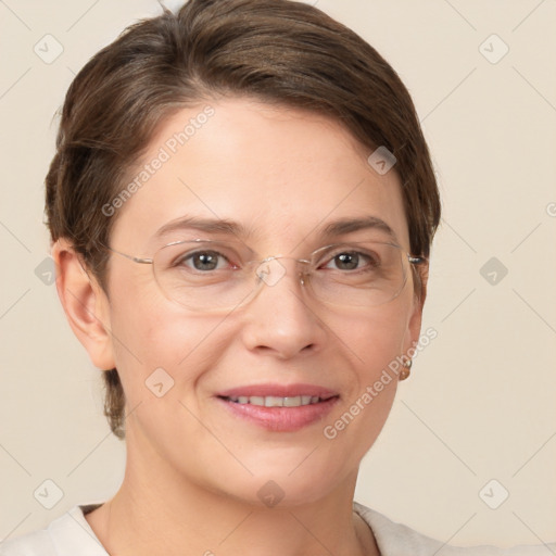 Joyful white adult female with short  brown hair and grey eyes