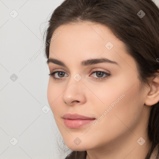 Neutral white young-adult female with long  brown hair and brown eyes