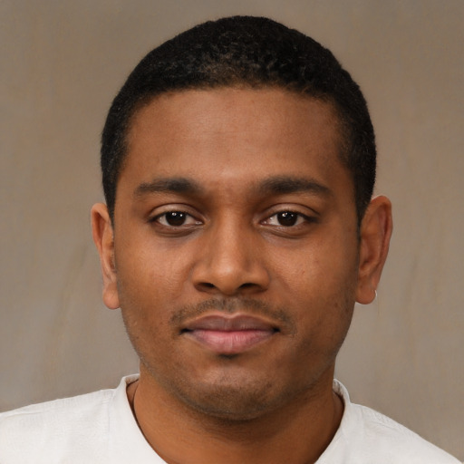 Neutral black young-adult male with short  black hair and brown eyes