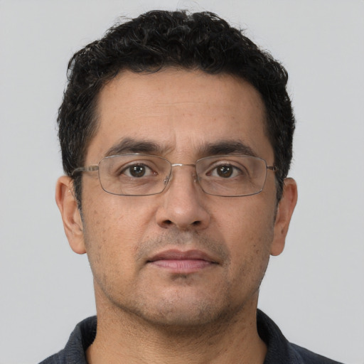 Neutral white adult male with short  brown hair and brown eyes