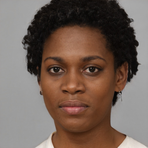 Neutral black young-adult female with short  black hair and brown eyes