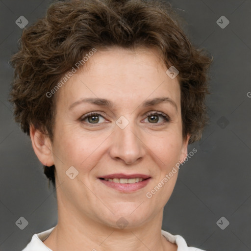 Joyful white adult female with short  brown hair and brown eyes