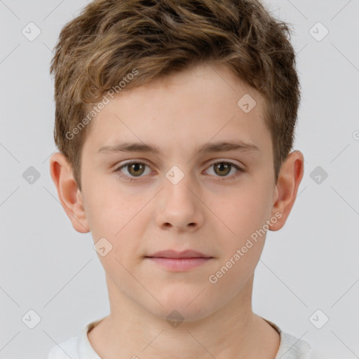 Joyful white child male with short  brown hair and brown eyes