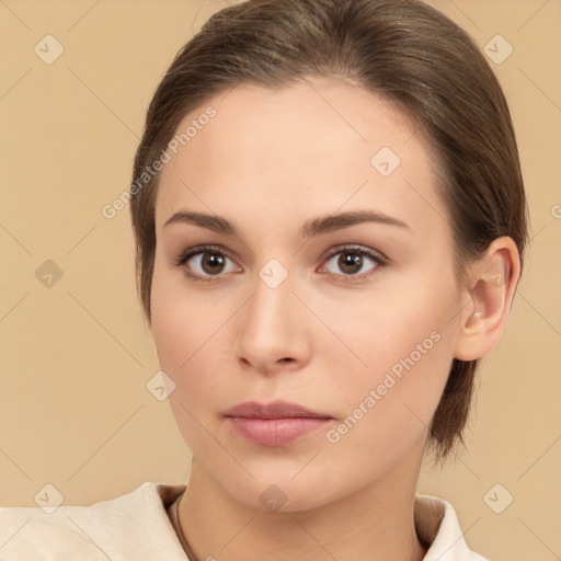 Neutral white young-adult female with medium  brown hair and brown eyes