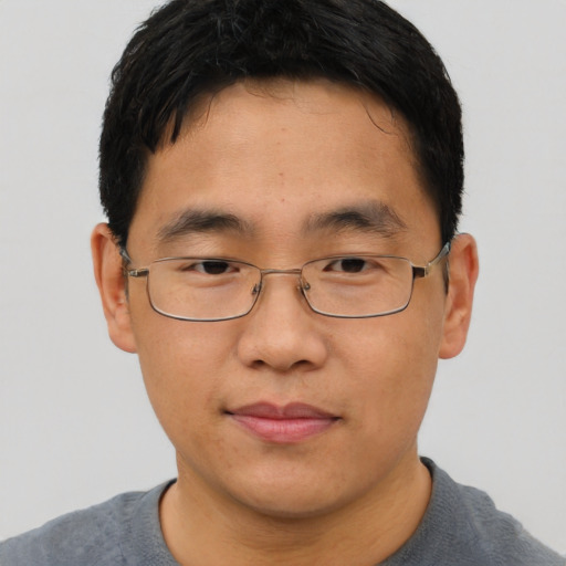 Neutral asian young-adult male with short  brown hair and brown eyes