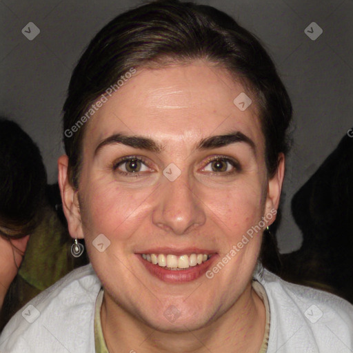 Joyful white adult female with short  brown hair and brown eyes