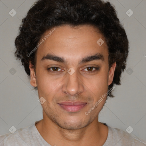 Joyful latino young-adult male with short  brown hair and brown eyes