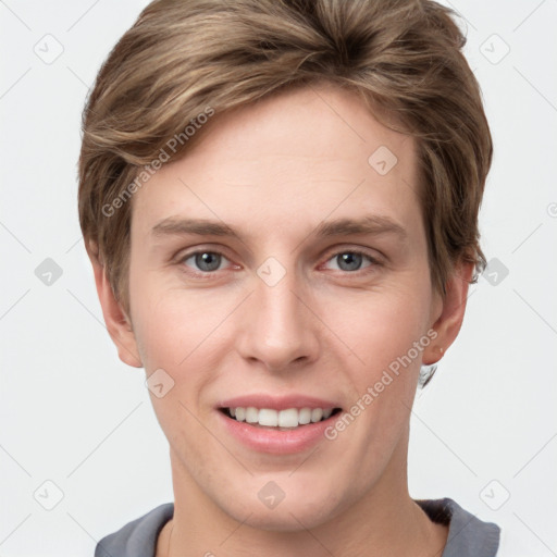 Joyful white young-adult female with short  brown hair and grey eyes