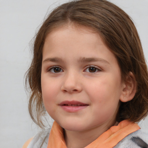 Joyful white child female with medium  brown hair and brown eyes