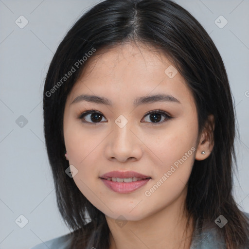 Joyful asian young-adult female with medium  black hair and brown eyes