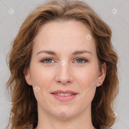 Joyful white young-adult female with long  brown hair and green eyes