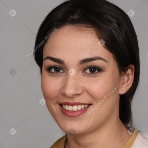 Joyful white young-adult female with medium  brown hair and brown eyes