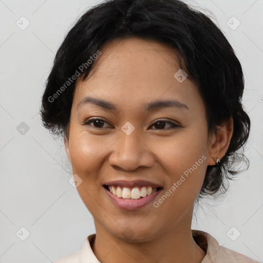 Joyful asian young-adult female with medium  brown hair and brown eyes