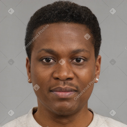 Joyful black young-adult male with short  brown hair and brown eyes