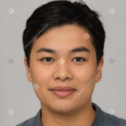 Joyful asian young-adult male with short  black hair and brown eyes