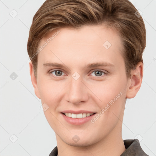 Joyful white young-adult female with short  brown hair and grey eyes