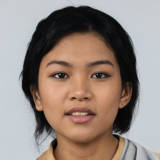 Neutral asian young-adult female with medium  black hair and brown eyes