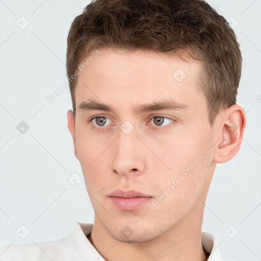 Neutral white young-adult male with short  brown hair and brown eyes