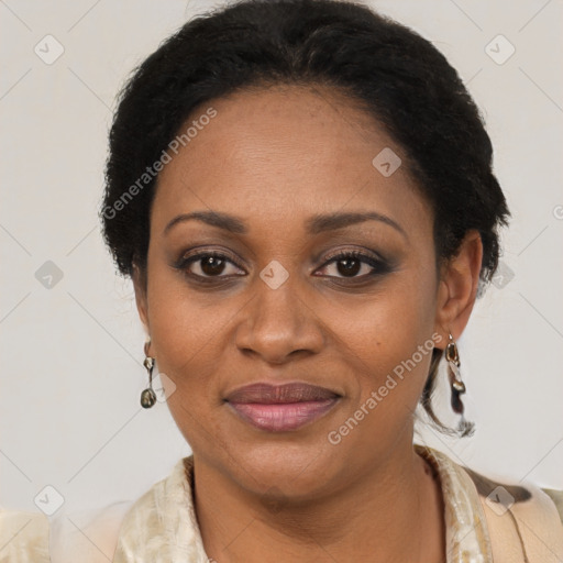 Joyful black adult female with short  brown hair and brown eyes