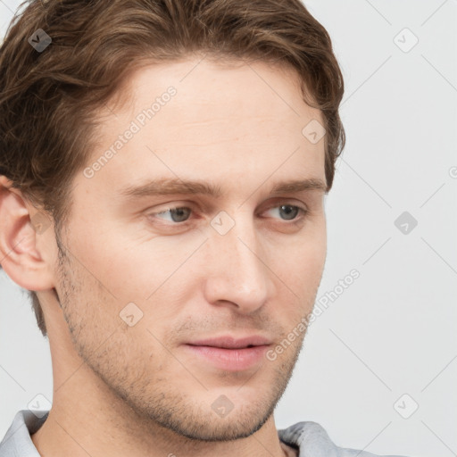 Neutral white young-adult male with short  brown hair and grey eyes