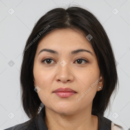 Joyful latino young-adult female with medium  brown hair and brown eyes