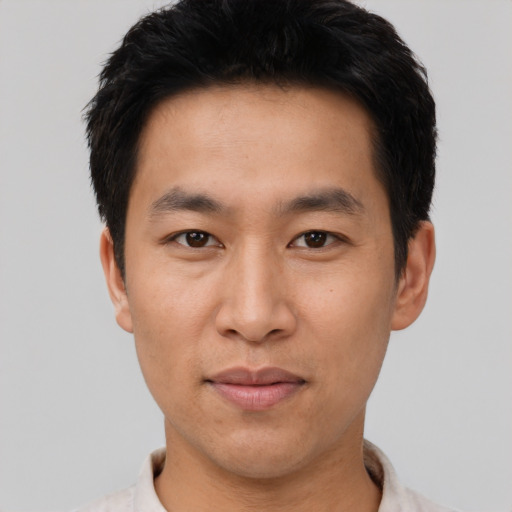 Neutral asian young-adult male with short  black hair and brown eyes