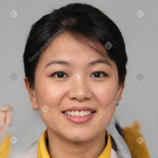 Joyful asian young-adult female with medium  brown hair and brown eyes