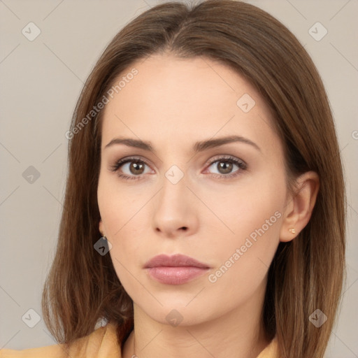 Neutral white young-adult female with long  brown hair and brown eyes