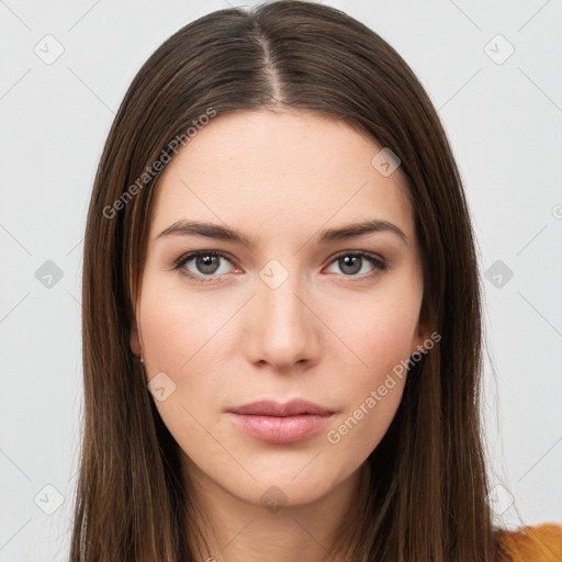 Neutral white young-adult female with long  brown hair and brown eyes