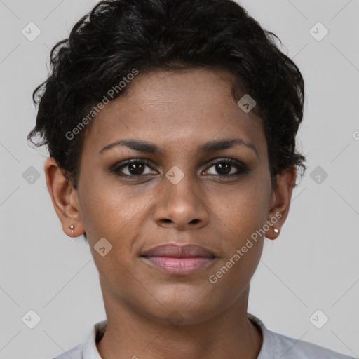 Joyful black young-adult female with short  brown hair and brown eyes
