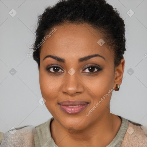 Joyful black young-adult female with short  brown hair and brown eyes