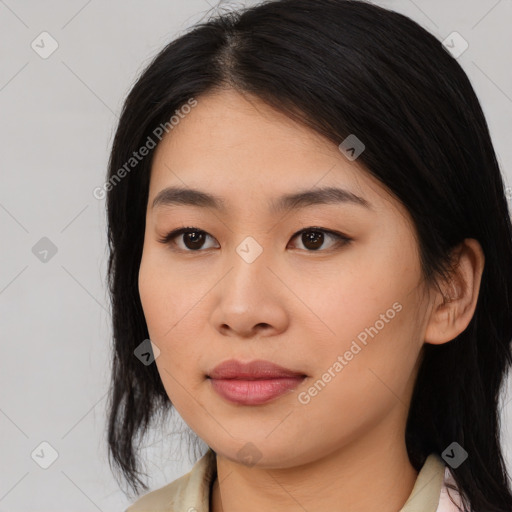 Joyful asian young-adult female with medium  black hair and brown eyes