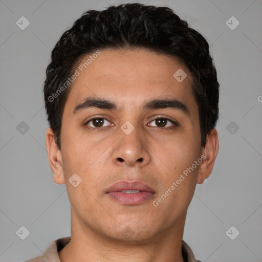 Neutral latino young-adult male with short  brown hair and brown eyes